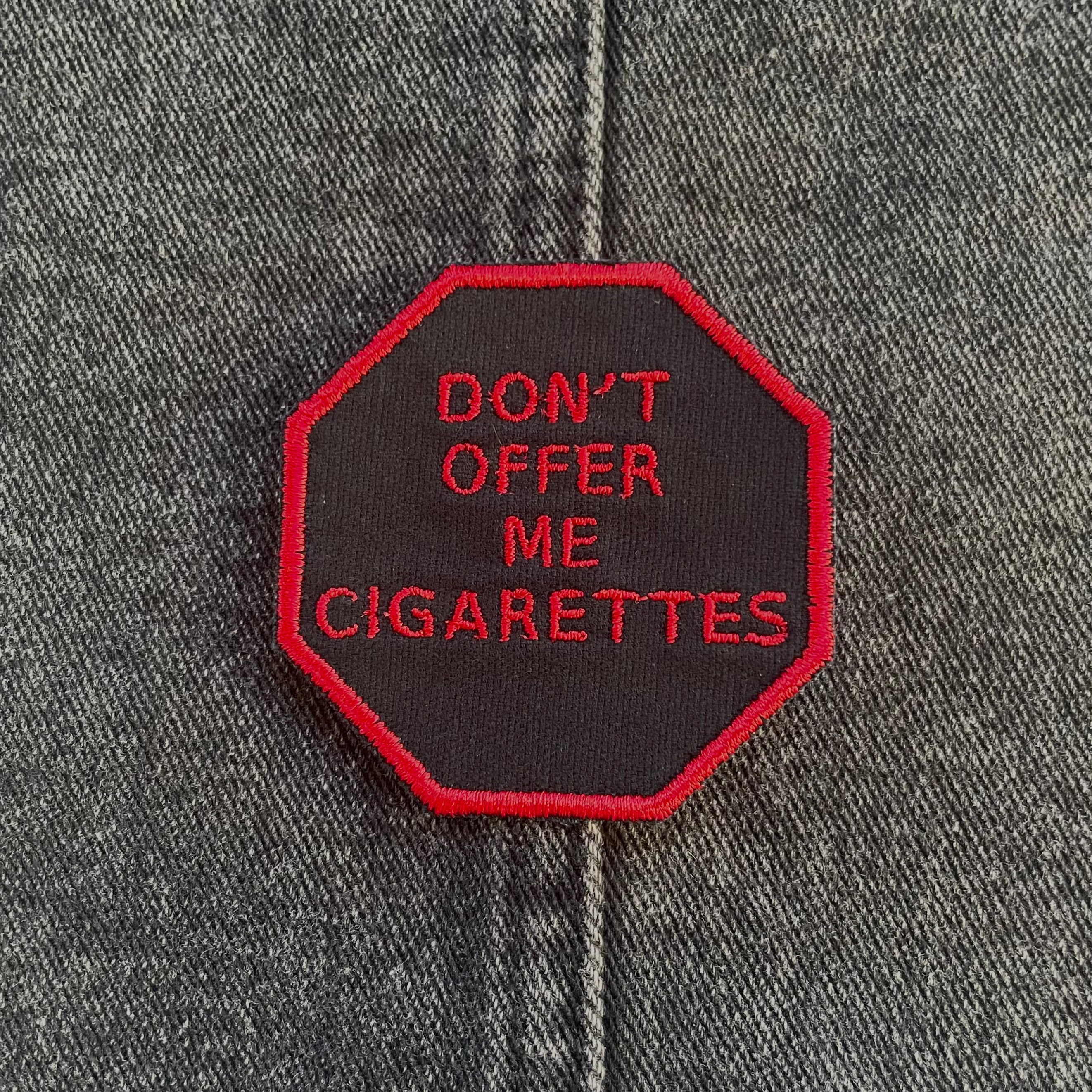 "Don't Offer Me Cigarettes," Stop Sign Patch