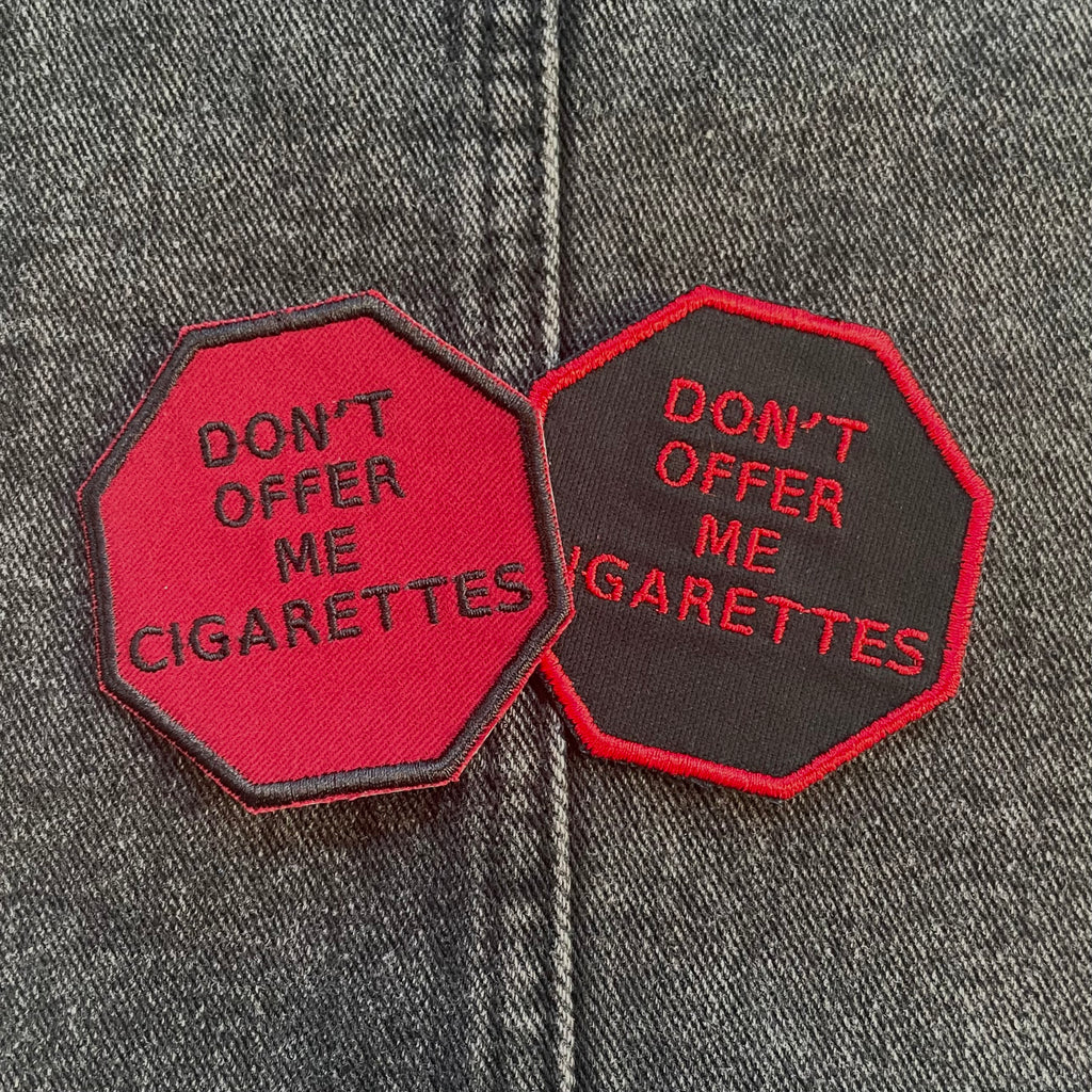 "Don't Offer Me Cigarettes," Stop Sign Patch